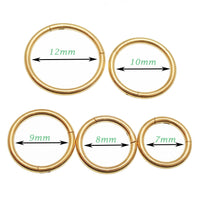 Plain titanium PVD gold clicker hoop earrings in 18g and 16g with a 7mm diameter, from Magpie Body Jewelry.
