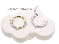 Clear titanium 16g taper baguette clicker with cubic zirconia from Magpie Body Jewelry, showcasing its sleek, modern design.
