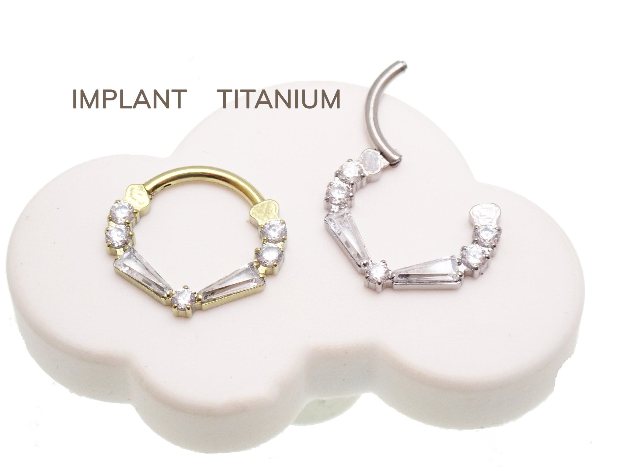 Clear titanium 16g taper baguette clicker with cubic zirconia from Magpie Body Jewelry, showcasing its sleek, modern design.