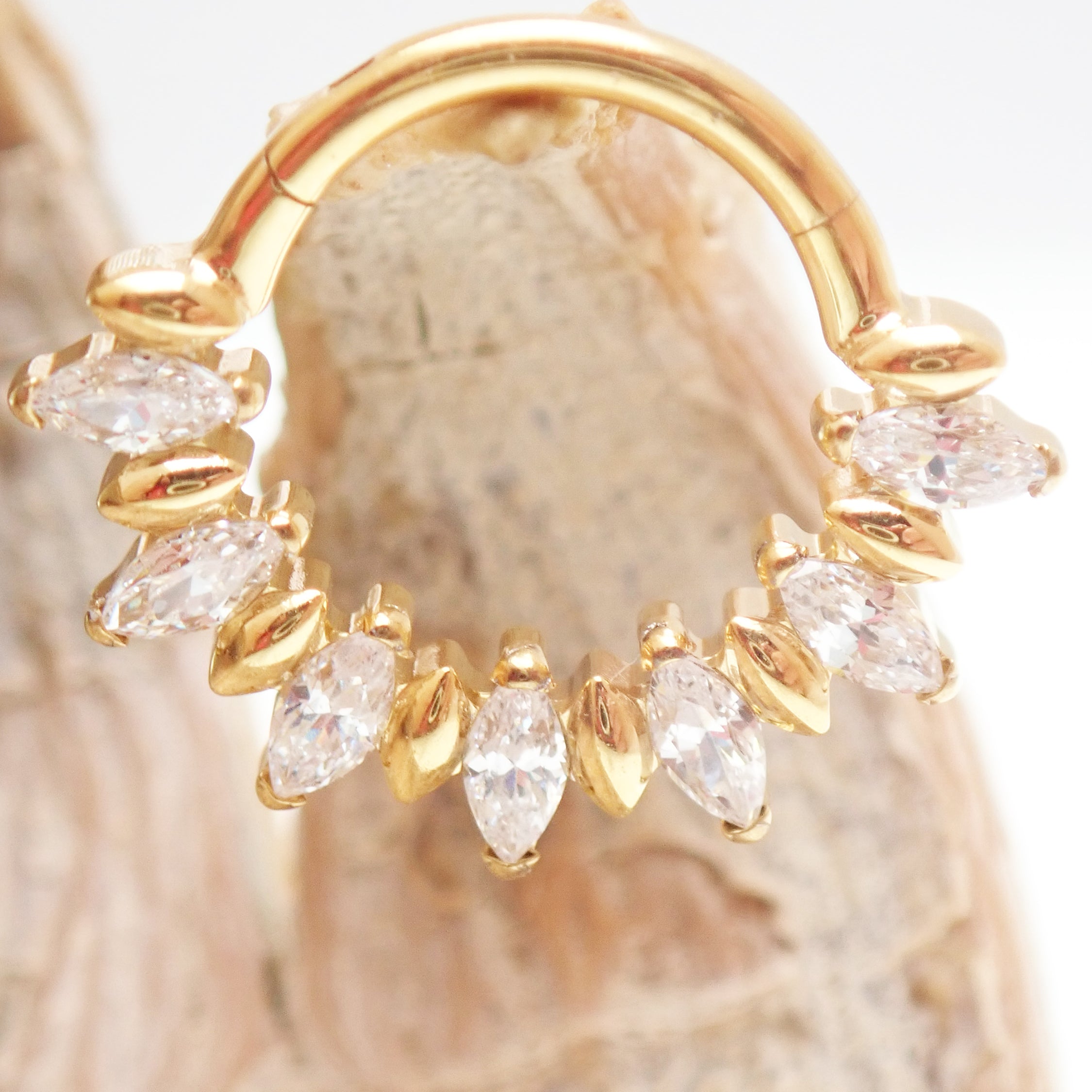 Gold titanium clicker hoop with CZ stones, 16G, 8mm diameter, featuring a PVD gold finish and magpie body jewelry branding.