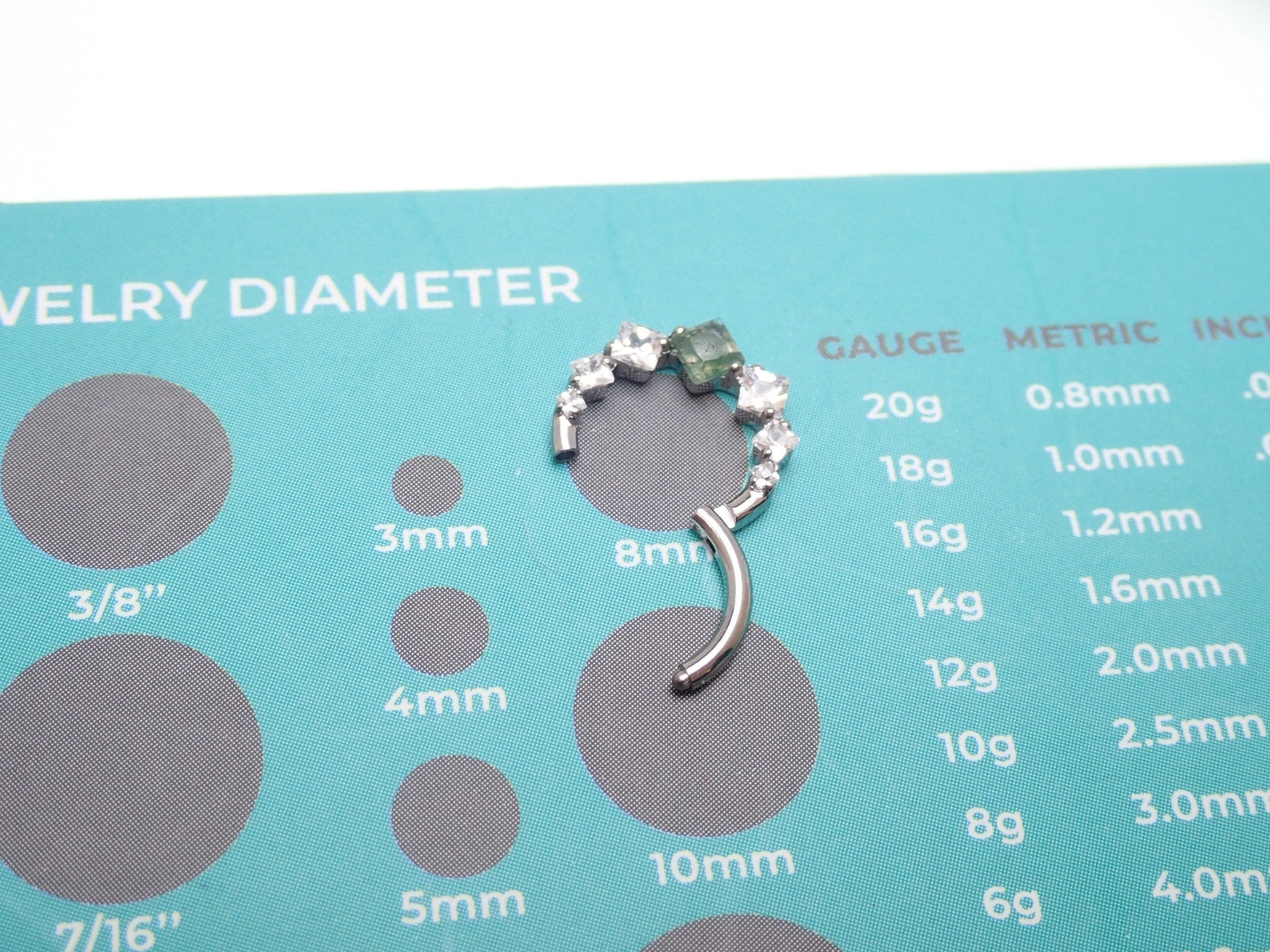 Moss Agate 8mm titanium clicker ear cartilage jewelry by Magpie Body Jewelry, 16g, featuring a natural stone design.