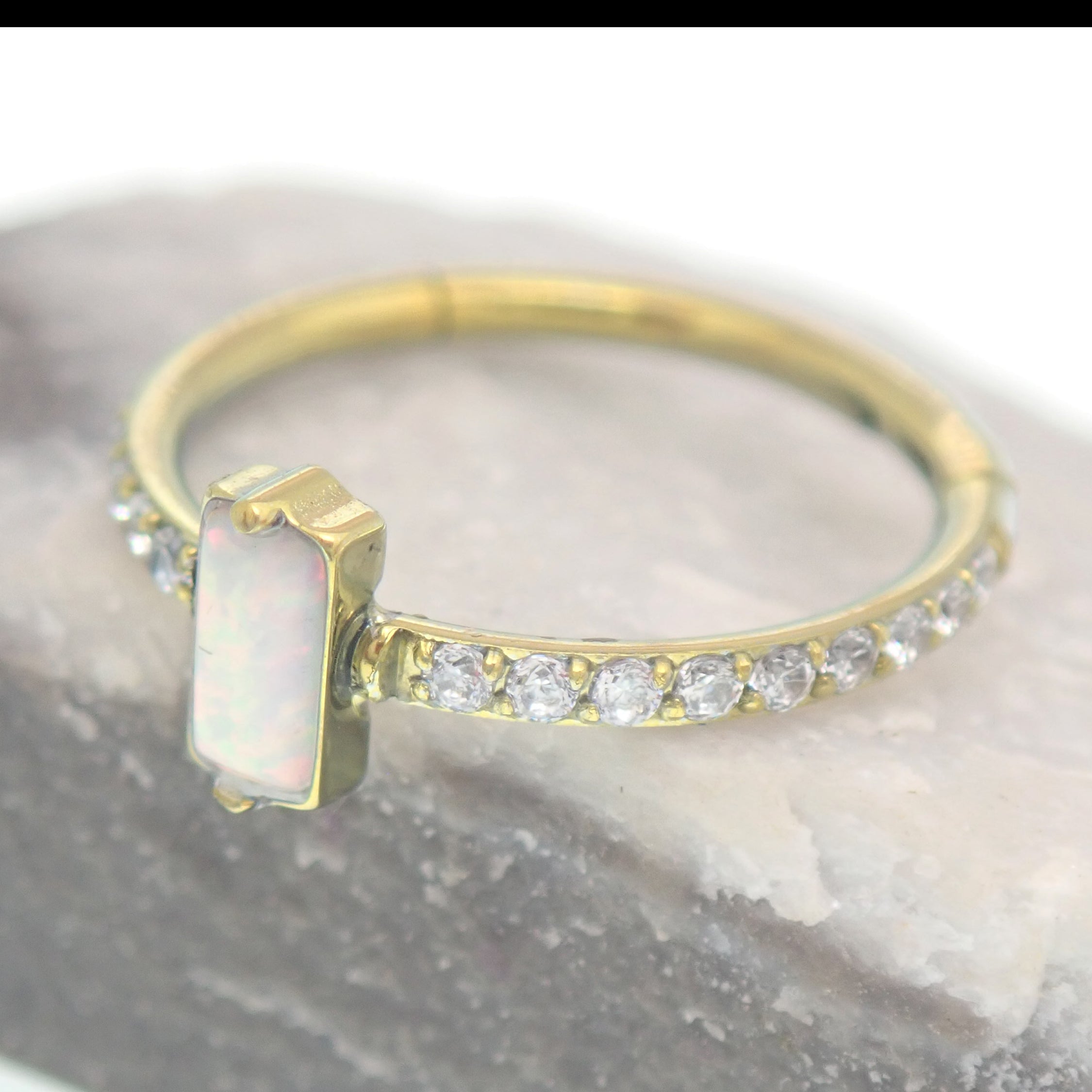 Rectangular white opal CZ titanium clicker earring in 16g size, 11mm, from Magpie Body Jewelry.