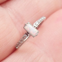 Rectangular white opal CZ titanium clicker earring in 16g size with 11mm length, from Magpie Body Jewelry.