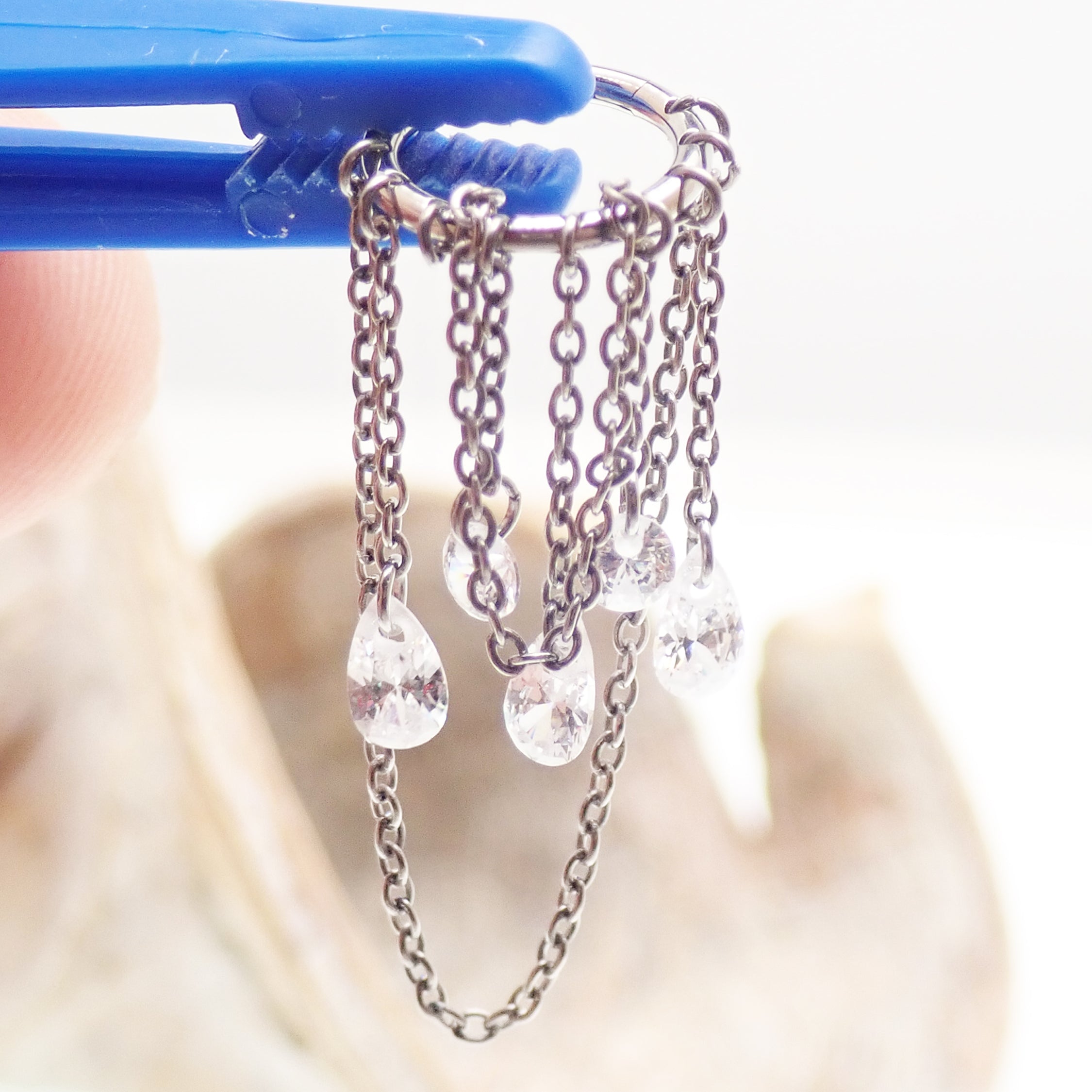 Titanium 8mm and 10mm multi-chain clicker jewelry with unique design by Magpie Body Jewelry, suitable for body piercing.