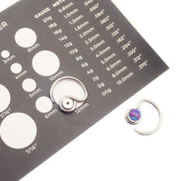 Niobium daith spiral body jewelry in 16g with customizable top design, featuring a sleek and modern look for pierced ears.
