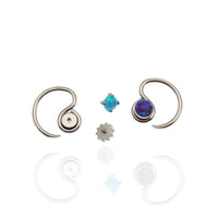 Niobium daith spiral body jewelry in 16g with customizable top design, by Magpie, featuring a sleek, curved shape for ear piercing.