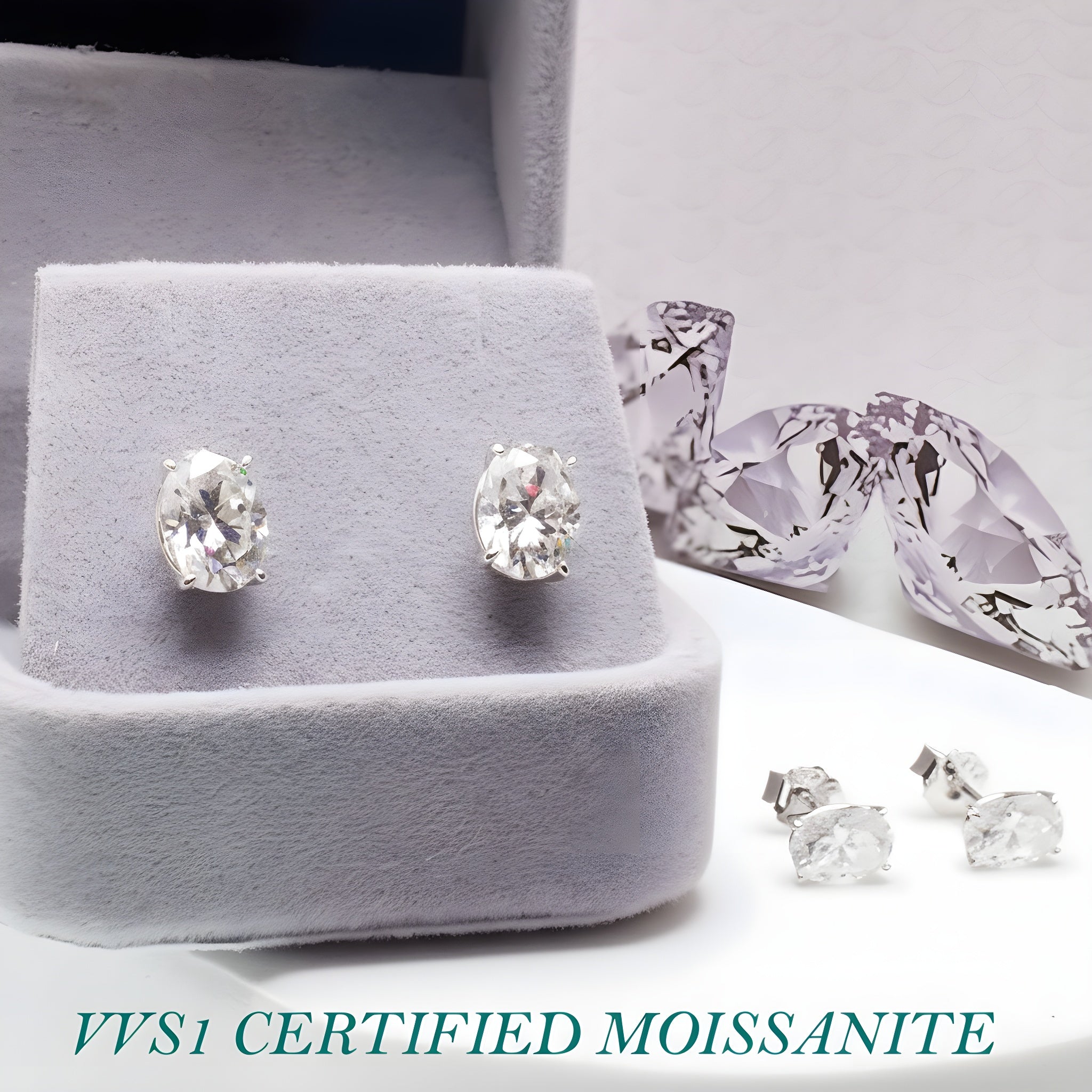Sterling silver moissanite oval earrings with certificate, 5x7mm size, elegant jewelry from Magpie Body Jewelry.