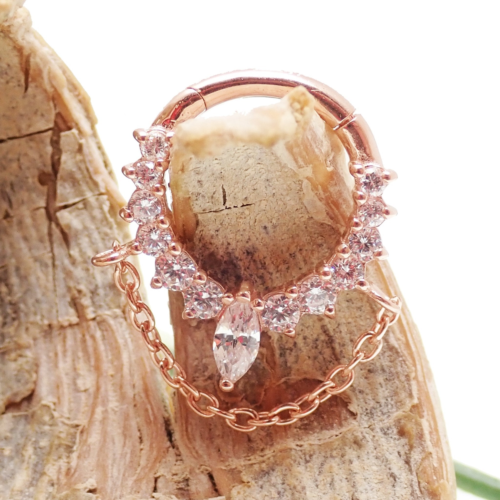 Sterling silver hinged clicker earring with 18k rose gold plating, 16 gauge, from magpie body jewelry.