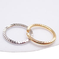 Sterling silver 20G nose hoop ring by Magpie Body Jewelry, 7mm diameter, simple and stylish nose ring accessory.