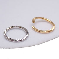 Sterling silver 20G nose hoop ring by Magpie Body Jewelry, 7mm diameter, designed for a stylish nose piercing.