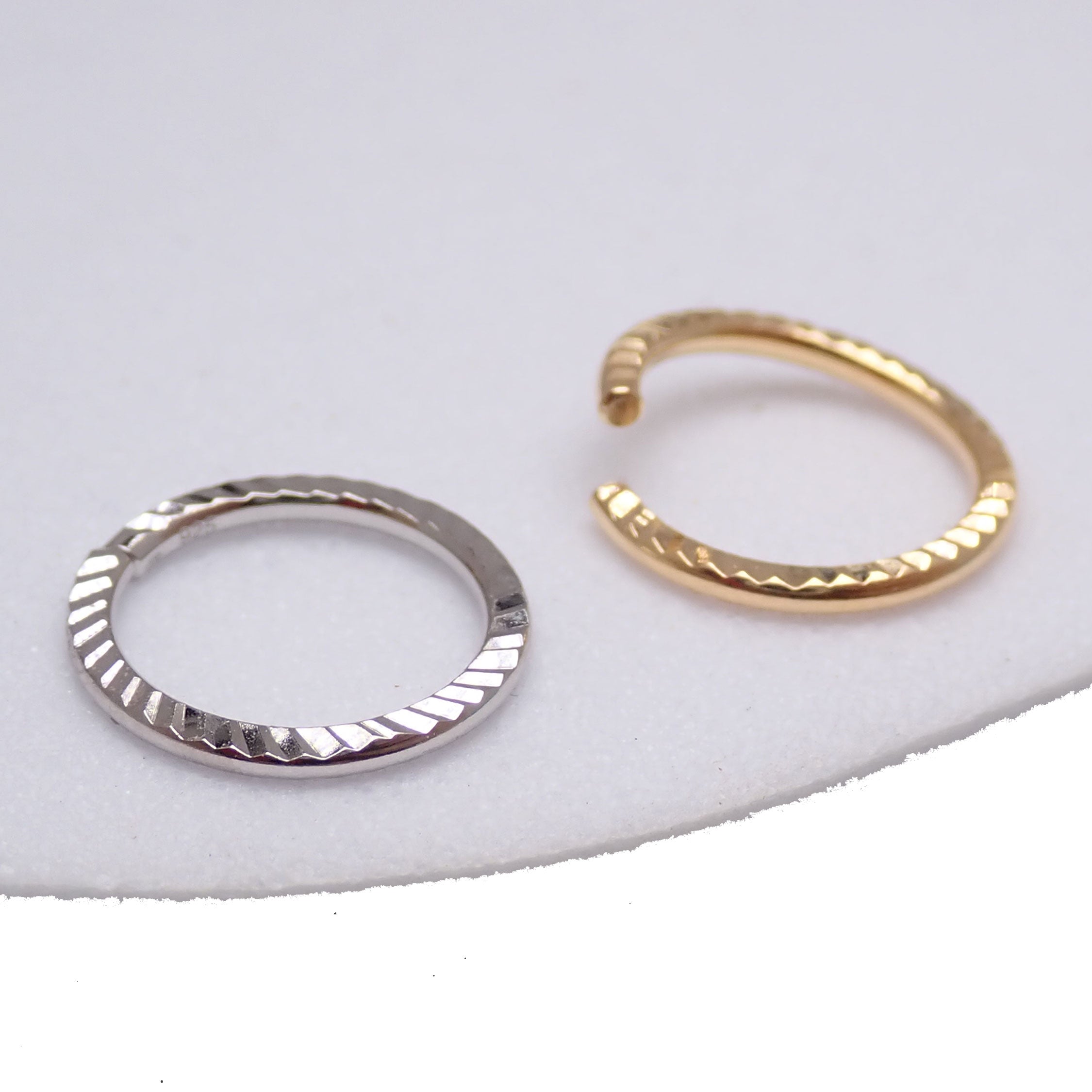 Sterling silver 20G nose hoop ring by Magpie Body Jewelry, 7mm diameter, designed for a stylish nose piercing.