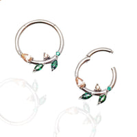 Sterling silver 925 leaf hinged clicker earrings with emerald green cubic zirconia from Magpie Body Jewelry.