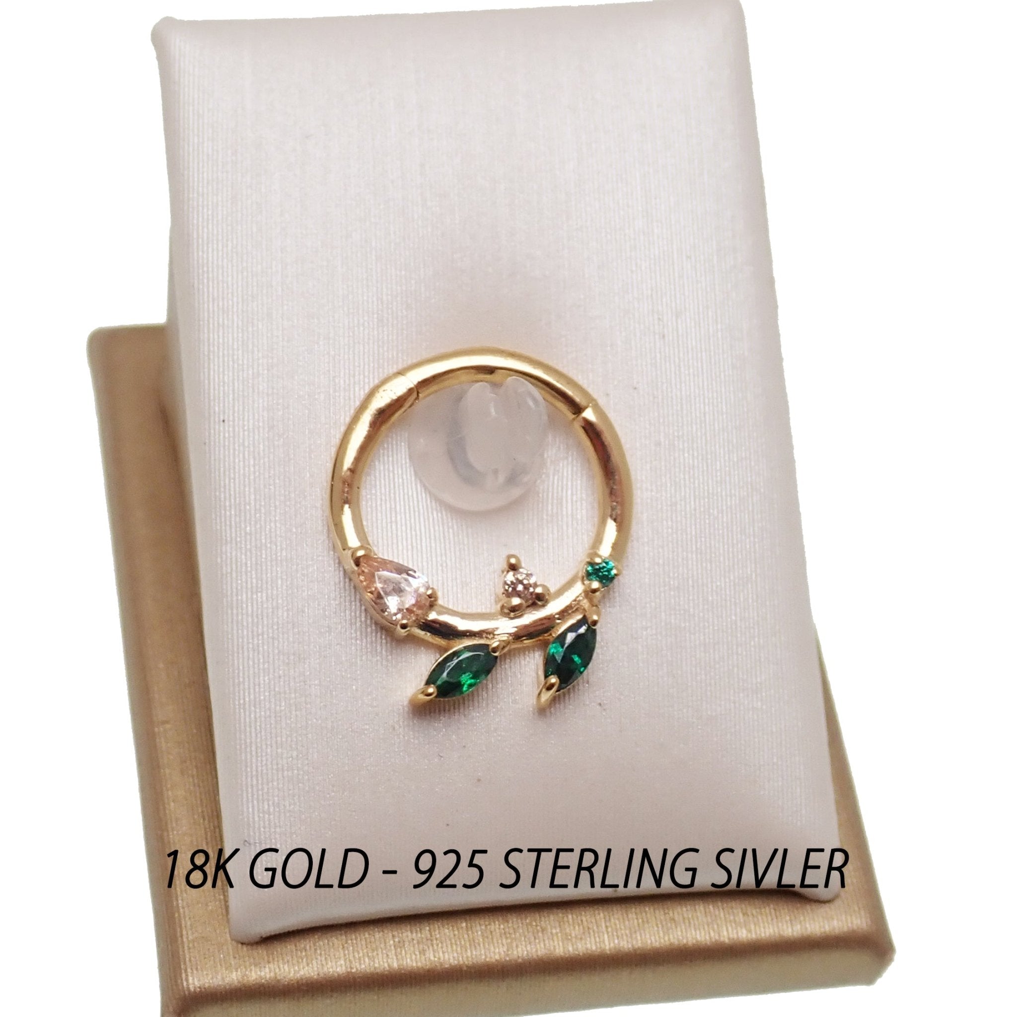 Sterling silver 925 leaf hinged clicker earring with emerald green CZ gemstone from magpie body jewelry.