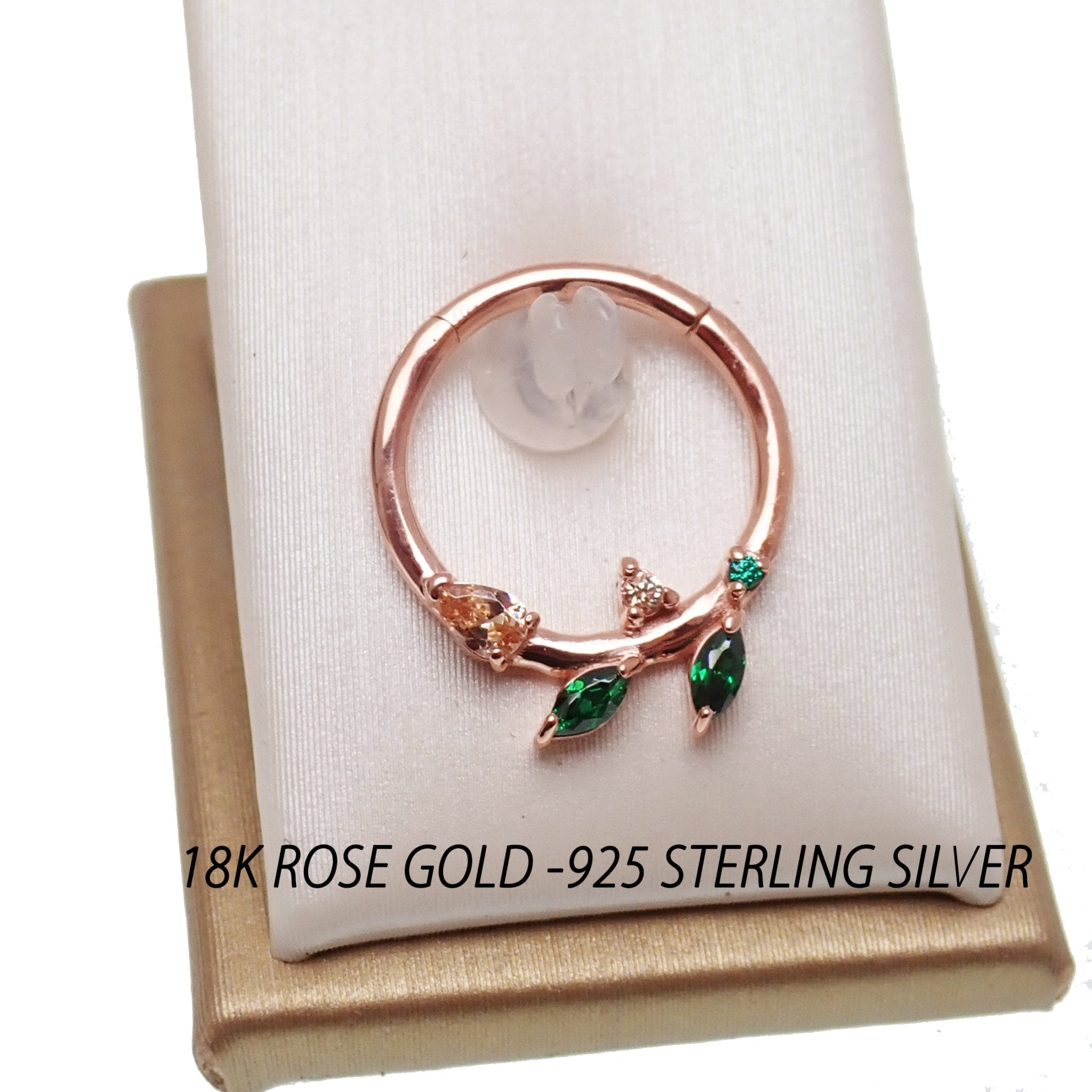 Sterling silver 925 leaf hinged clicker earring with emerald green cubic zirconia from Magpie Body Jewelry