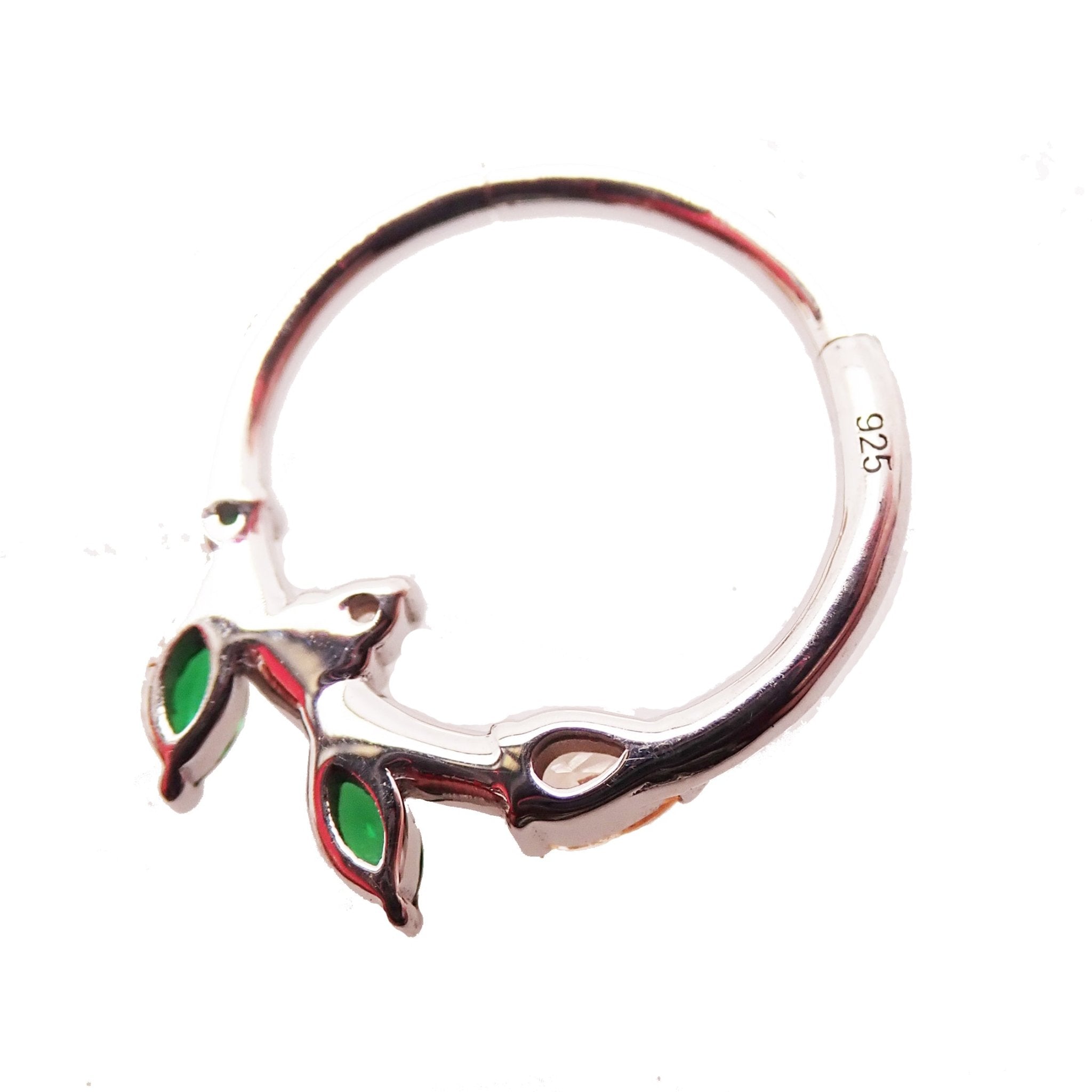 Sterling silver 925 leaf hinged clicker with emerald green CZ gemstone, designed by Magpie Body Jewelry.
