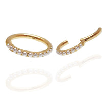 Magpie Pearl PVD titanium hinged clicker ring with 6mm pearl, 16g, showcasing the jewelry's elegant design and smooth hinge.