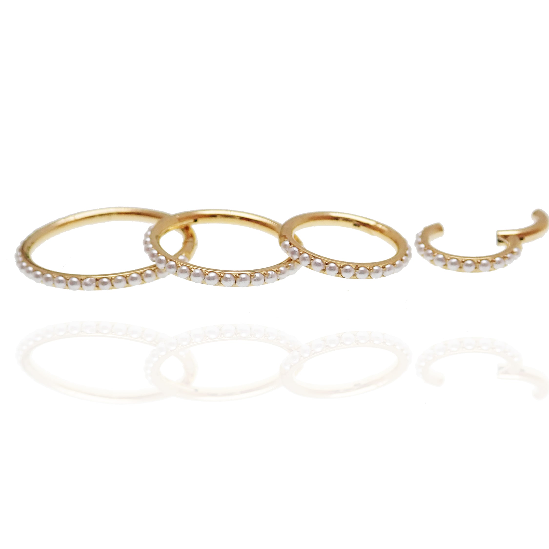 Magpie pearl PVD titanium hinged clicker ring with 6mm pearl, 16g, featuring a sleek, modern design for cartilage or ear piercing.