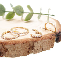Pearl PVD titanium hinged clicker ring with 6mm pearl detail, 16g, by Magpie, showcasing the elegant jewelry design.