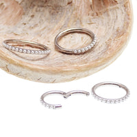Magpie pearl titanium hinged clicker ring with 6mm pearl and 16g gauge, designed for body piercing jewelry.