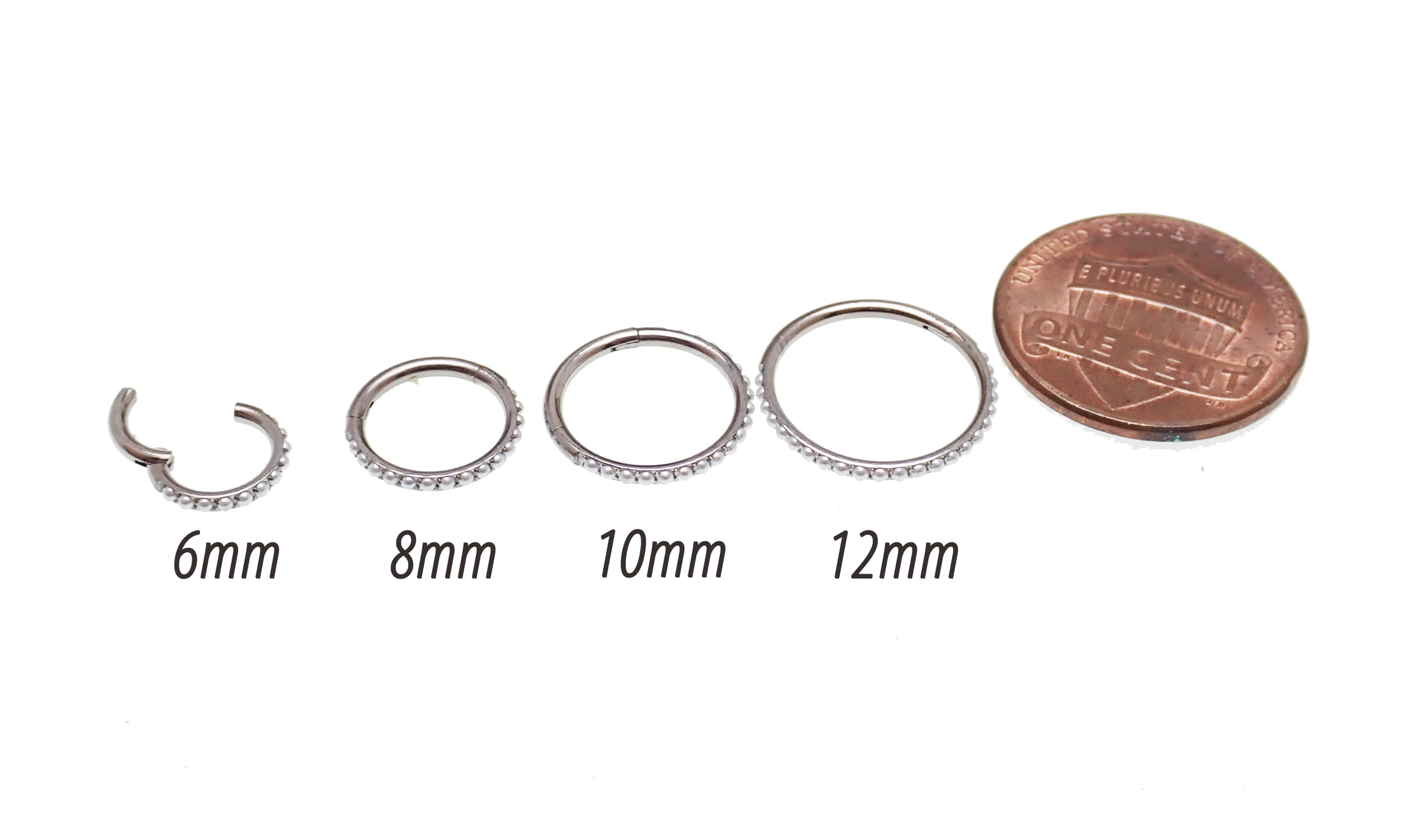 Magpie titanium hinged clicker ring with 6mm pearl detail, 16g, designed for body piercing jewelry.