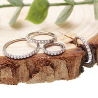 Magpie pearl titanium hinged clicker ring with 6mm pearl, 16g, featuring a sleek, modern design for body jewelry.