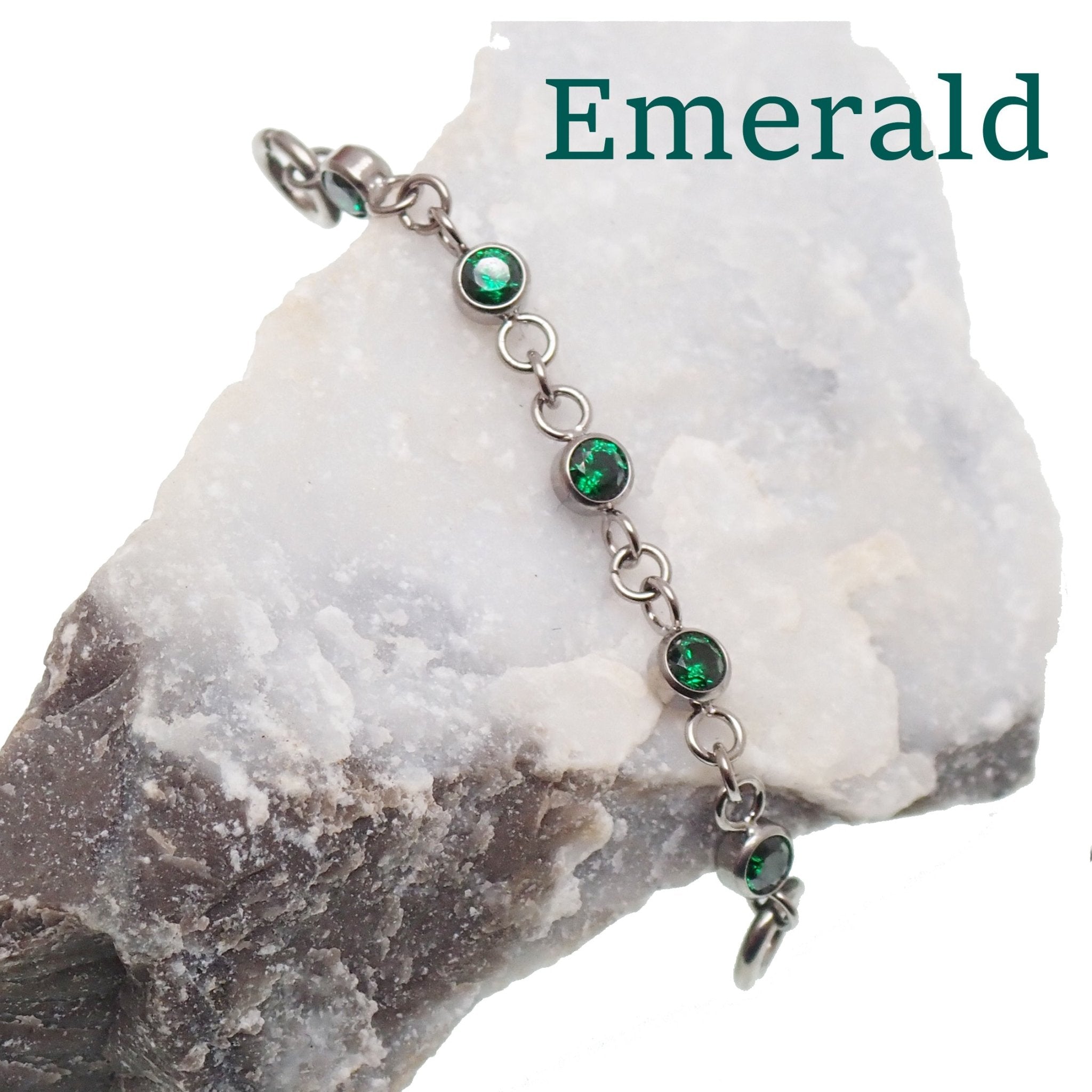 Magpie titanium and CZ ear cuff chain with emerald accents, 32mm or 38mm add-on piercing chain, stylish and dainty jewelry piece.