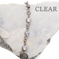Magpie titanium and CZ ear cuff chain with emerald accents, 32mm or 38mm add-on piercing chain for stylish ear jewelry.