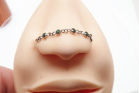 Magpie titanium and CZ ear cuff chain with emerald accents, 32mm or 38mm add-on piercing chain for stylish ear jewelry.