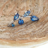 Magpie titanium flat back helix piercing with clear CZ stone, 18g, 6mm internally threaded vine design for ear cartilage.