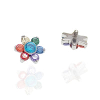 Internally threaded titanium flower top flat back helix earring with multiple CZ stones by Magpie.
