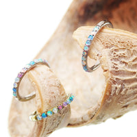 Pastel Opal titanium hinged clicker earring by Magpie, 16g/18g, side-facing view with 6mm diameter for body piercing jewelry.