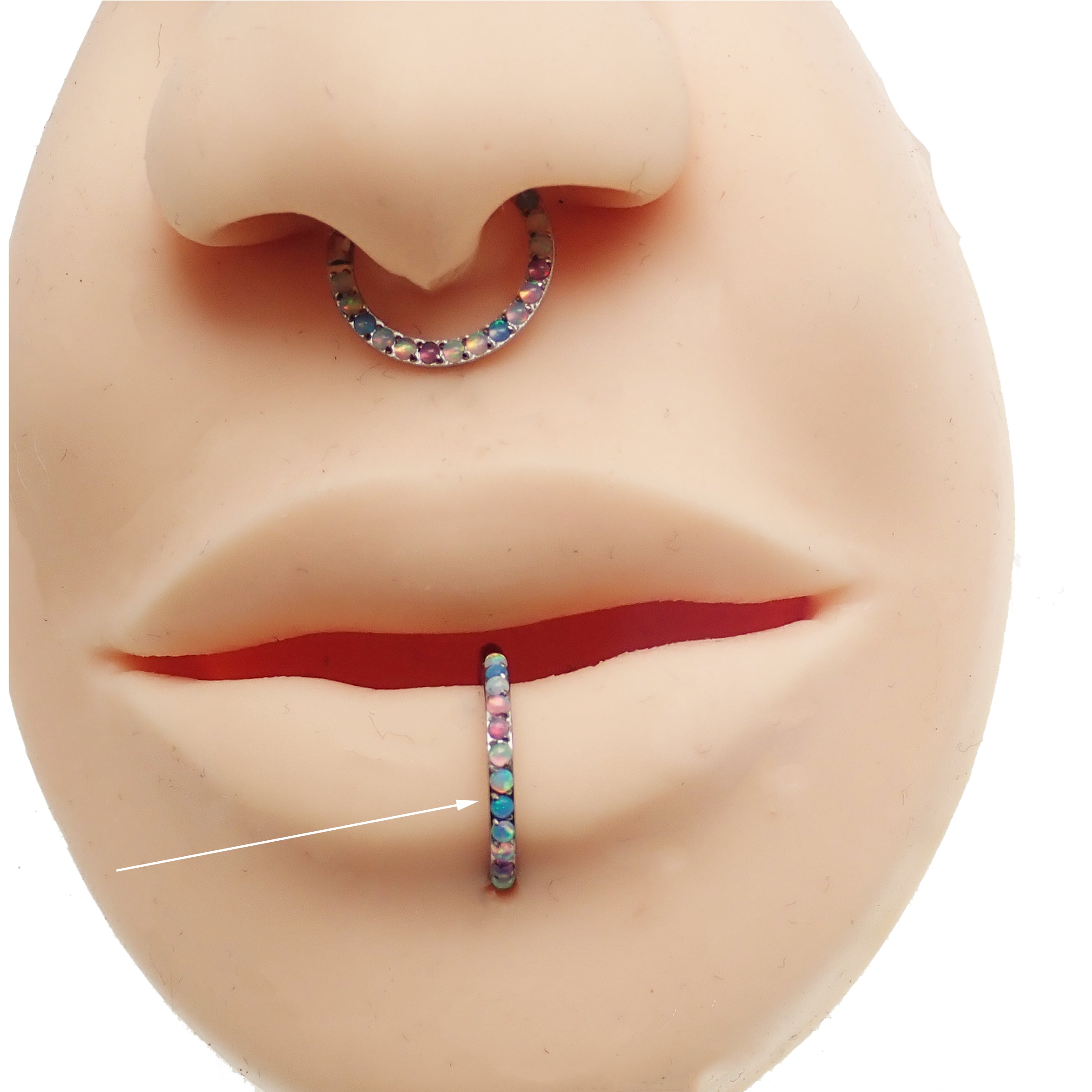 Magpie pastel opal titanium hinged clicker in 16g/18g with side-facing design, featuring a 6mm gemstone and secure hinge closure.