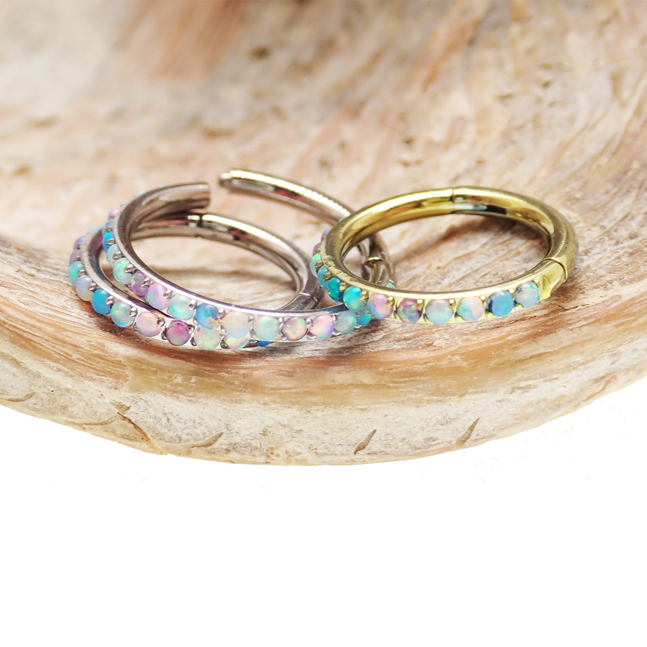 Pastel Opal titanium hinged clicker earring by Magpie, 16g/18g, with side-facing design and 6mm diameter.