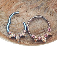 Magpie Champagne and Pink Titanium Hinged Clicker 16g for body jewelry, featuring a sleek, colorful design and secure clasp.