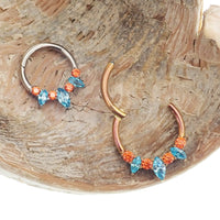 Magpie teal and orange titanium hinged clicker 16g with 8mm size, featuring a stylish and durable design for body jewelry.