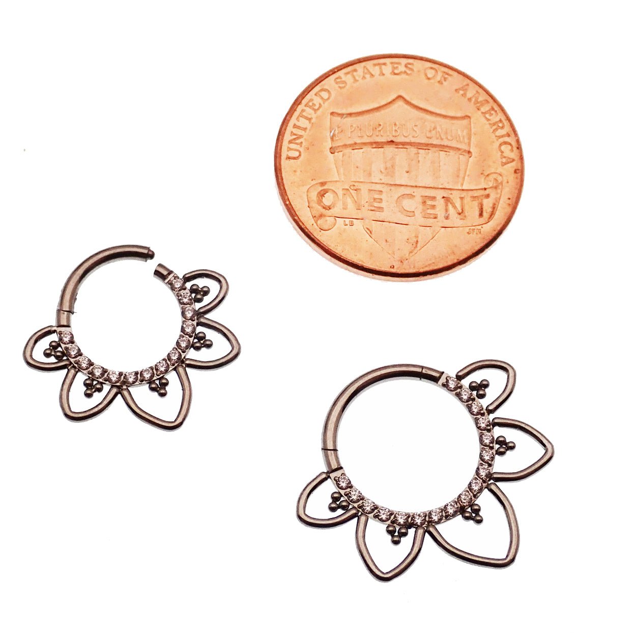 Magpie CZ Filigree Titanium hinged clicker earring in 16g with intricate design, featuring a secure hinged closure.