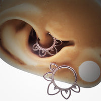 Magpie CZ filigree titanium hinged clicker earring in 16g with intricate design and secure closure.