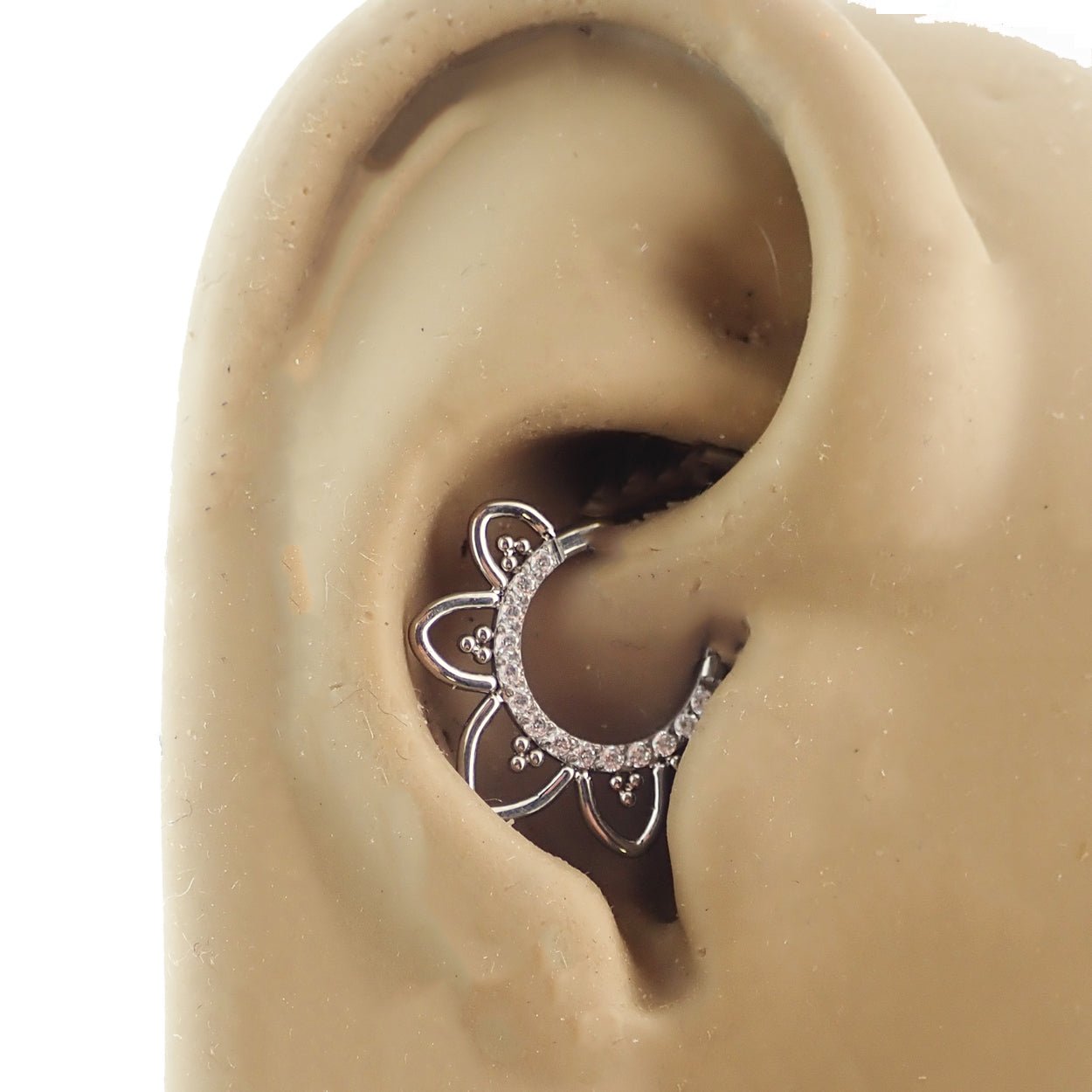 Magpie CZ filigree titanium hinged clicker in 16g, featuring intricate design and secure click closure for body jewelry.