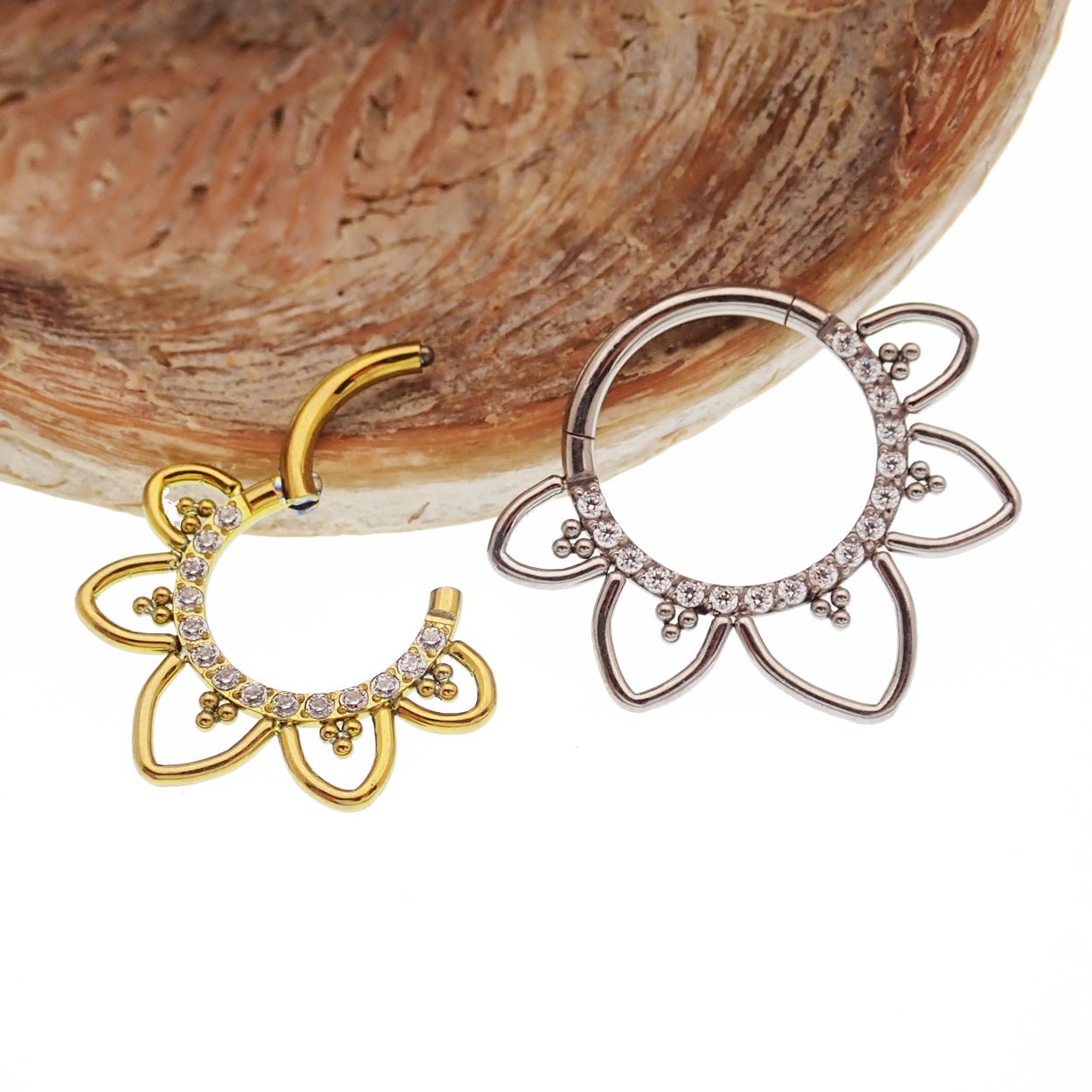 Magpie CZ filigree titanium hinged clicker earring in 16g, showcasing intricate metalwork and secure hinge closure.