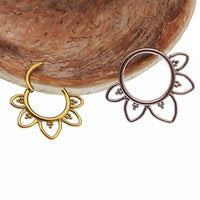 Plain filigree titanium hinged clicker earring in 16g from Magpie, featuring intricate metalwork and an open design.
