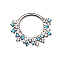 Magpie 16g titanium Sunburst CZ hinged clicker earrings in blue with 8mm and 10mm sizes, featuring a vibrant sunburst design.