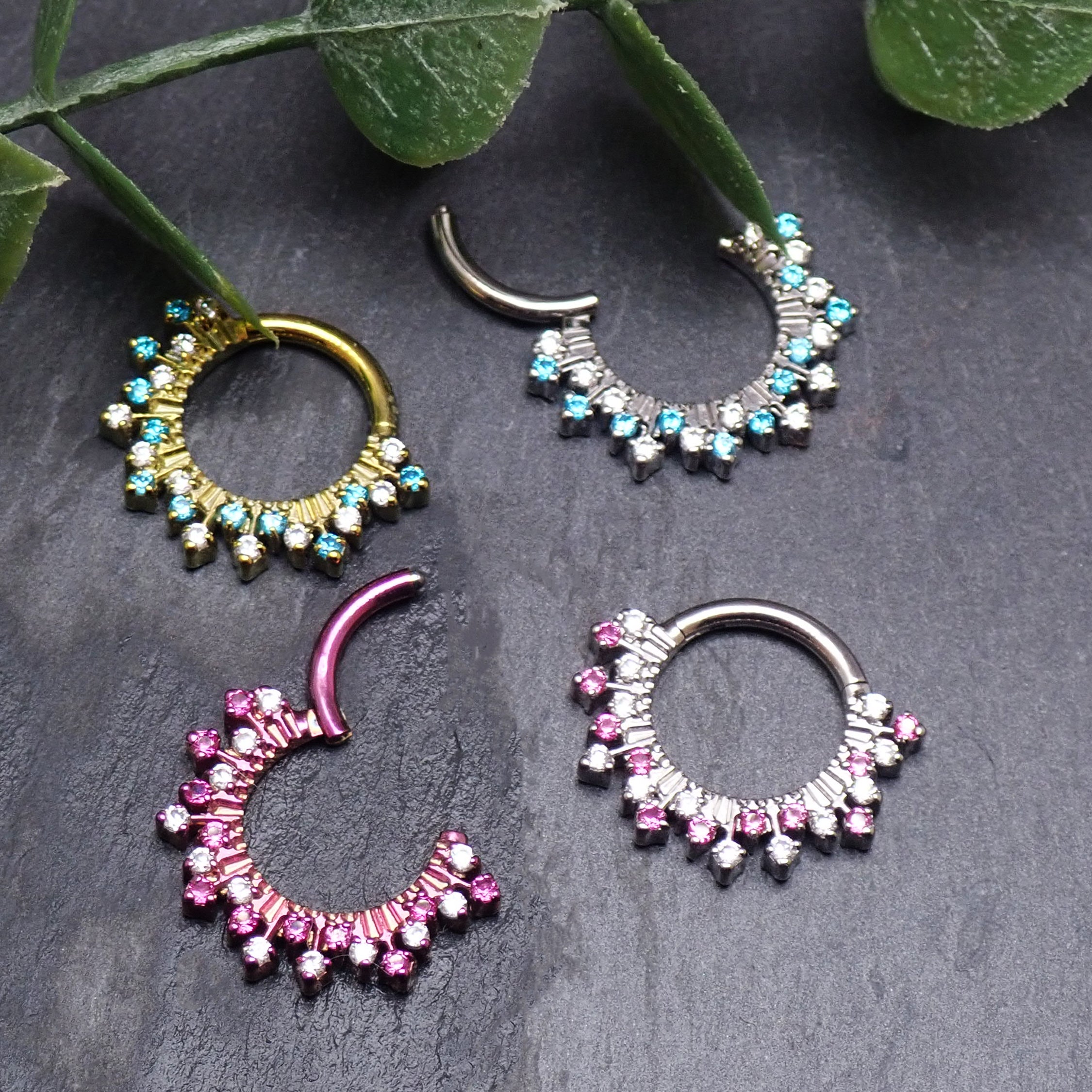 Magpie 16g titanium sunburst CZ hinged clicker earrings in 8mm and 10mm sizes, featuring vibrant sunburst design and sparkling stones.