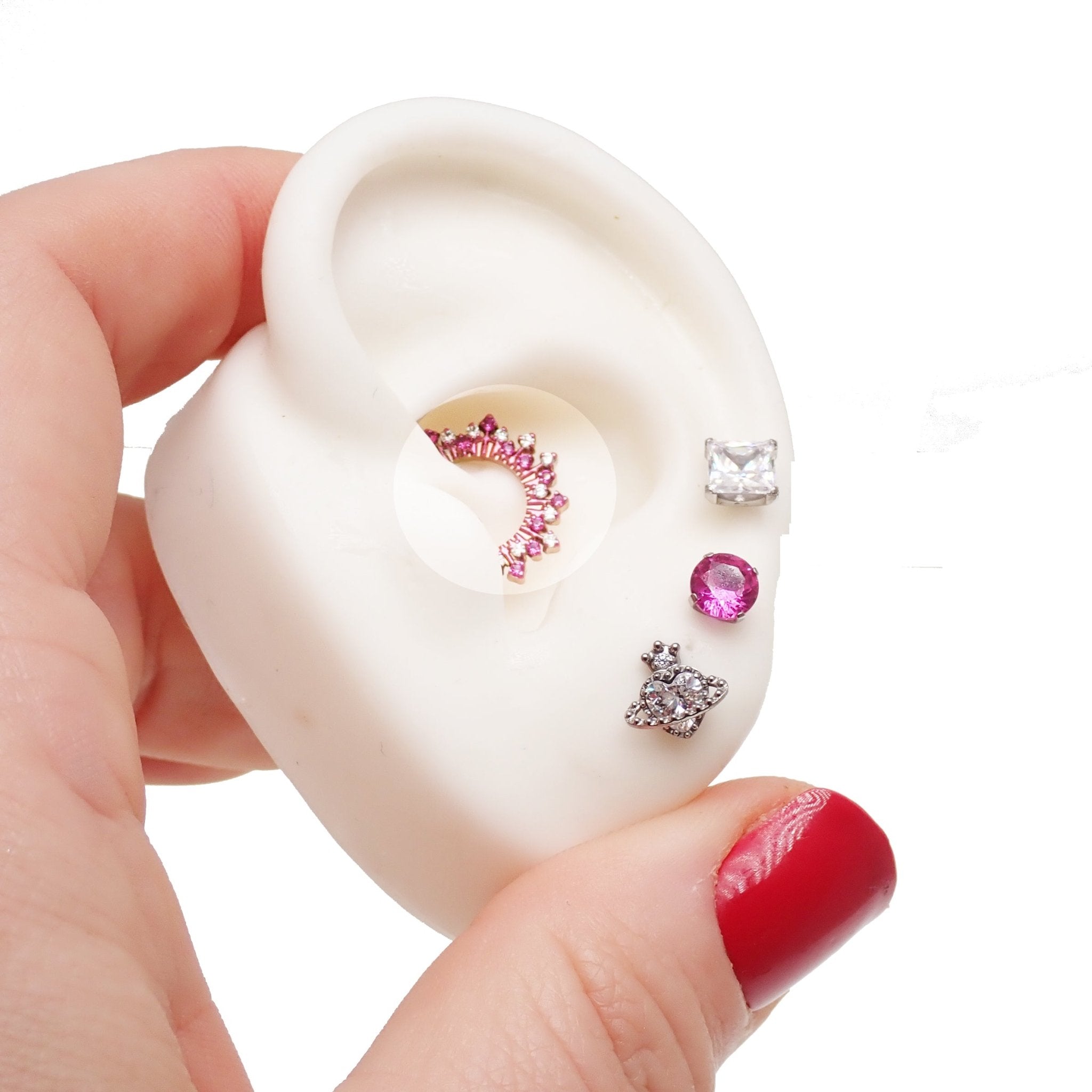 Pink and clear 16g titanium Sunburst CZ hinged clicker with 8mm and 10mm sizes, by Magpie, featuring a vibrant sunburst design.