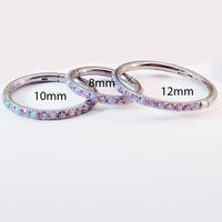 Magpie 16g titanium hinged clicker hoop with lavender opal and CZ stones, available in 8, 10, 12mm sizes.