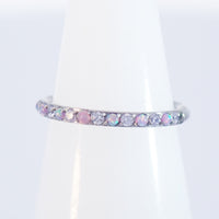 Magpie 16g titanium hinged clicker hoop with lavender opal and CZ stones, available in 8, 10, and 12mm sizes, for body piercing.