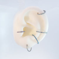 Magpie 16g titanium hinged clicker hoop with opal and cubic zirconia stones, available in 8mm, 10mm, and 12mm sizes.