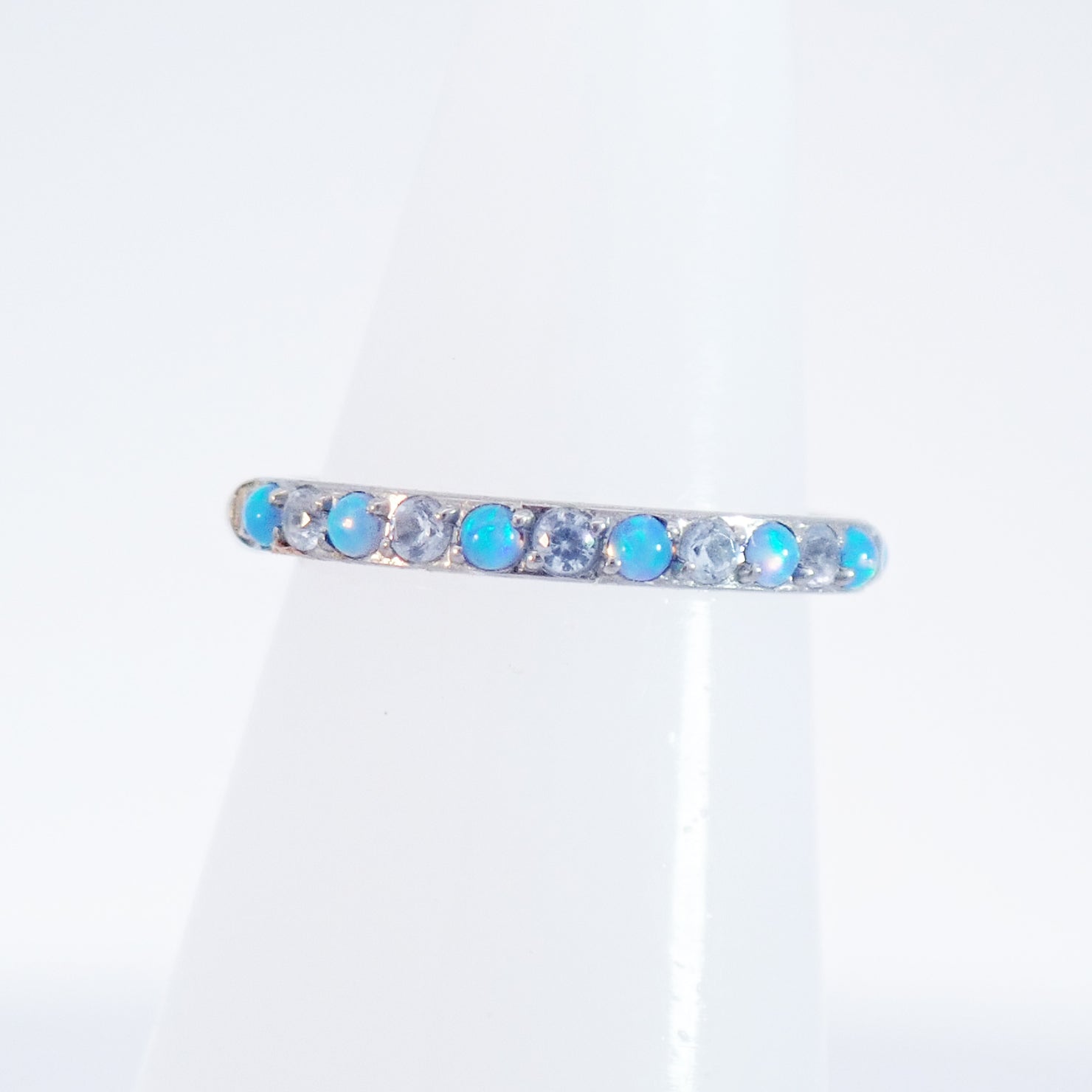 Azure blue opal and CZ hinged clicker hoop by Magpie, 8, 10, or 12mm, showcasing a stylish titanium jewelry design.
