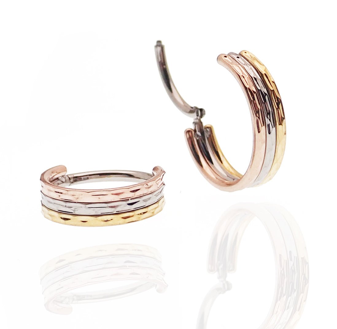 Hammered Trio metal septum clicker by Magpie, 8mm stacked design, 16g, with textured hammered finish and layered metal style.