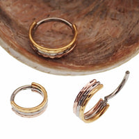 Hammered Trio metal septum clicker by Magpie, 16g, 8mm, stacked design with hammered finish, suitable for body piercing.