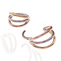 Magpie triple metal stacked titanium septum clicker, 8mm, 16g, featuring layered metal design and secure clicker closure.